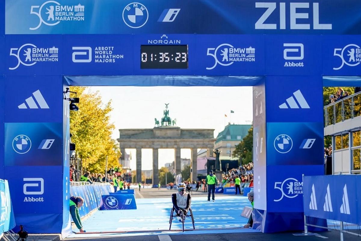 Paralympic marathon champions Catherine Debrunner and Marcel Hug win